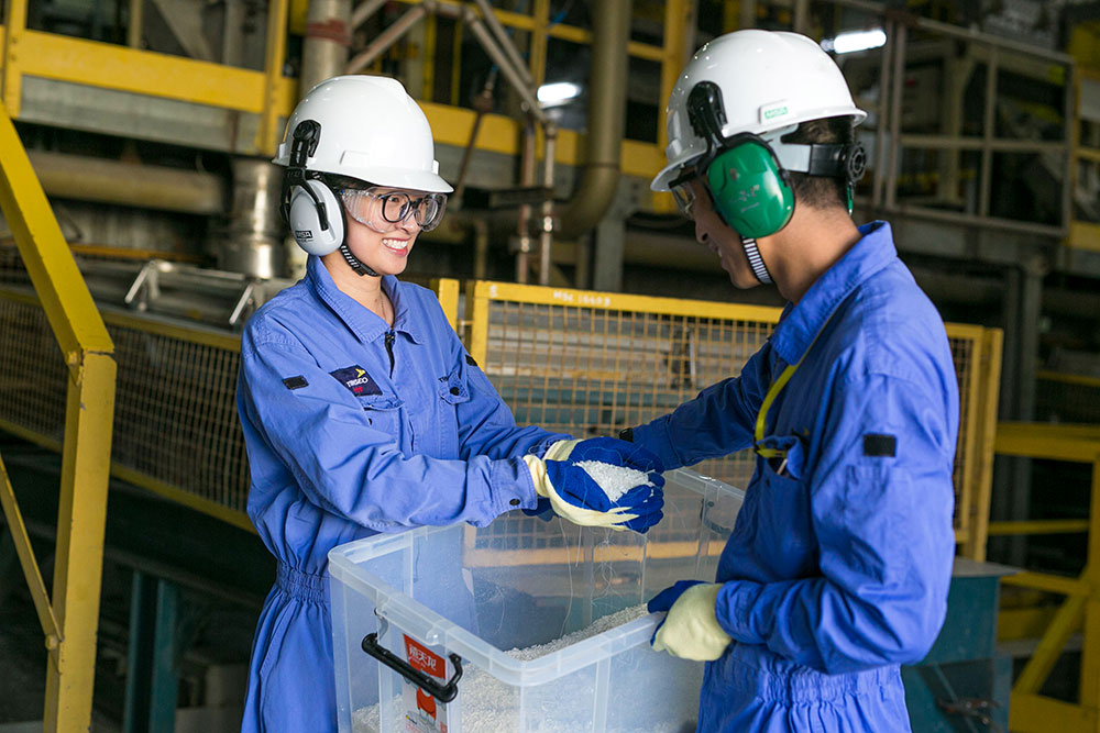 image of workers shaking hands